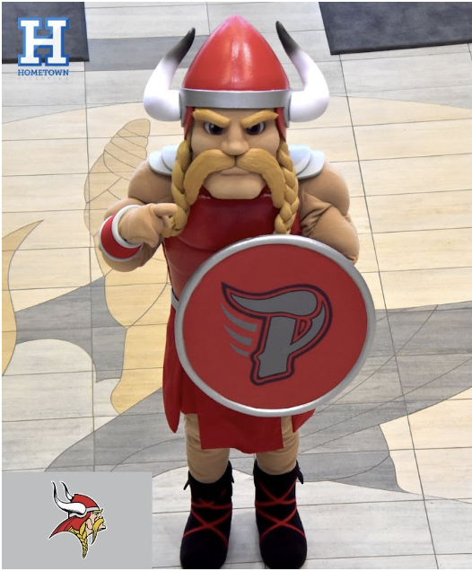 Viking Mascot (costumed) in the center of Viking Village